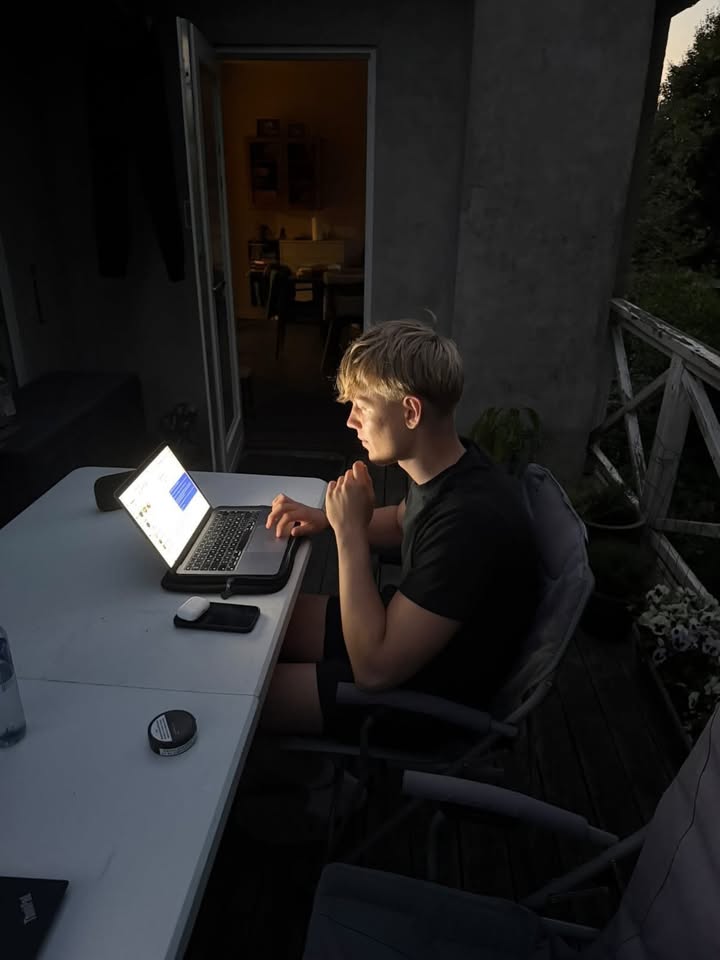 Emil working late behind his laptop on a Meta Ads account